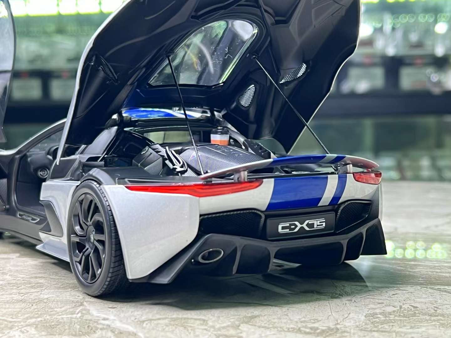 Almost Real Jaguar CX-75 1/18 (Lightning Silver/ Blue Stripes)