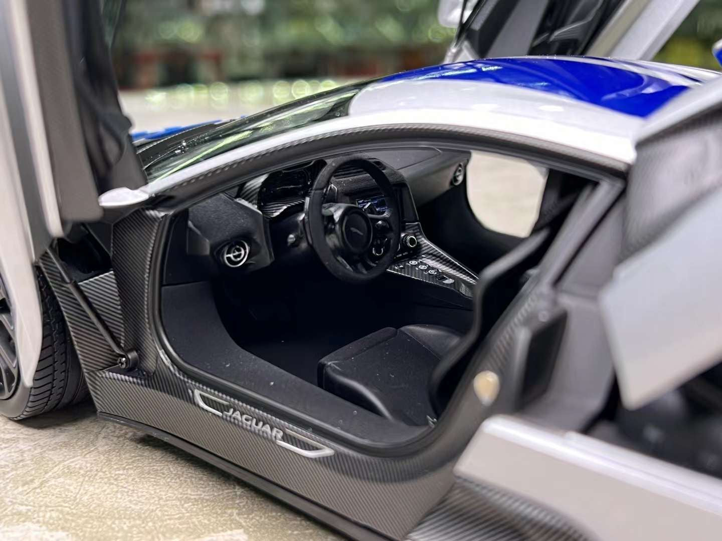 Almost Real Jaguar CX-75 1/18 (Lightning Silver/ Blue Stripes)