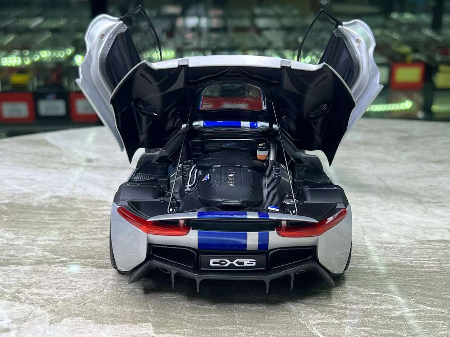 Almost Real Jaguar CX-75 1/18 (Lightning Silver/ Blue Stripes)